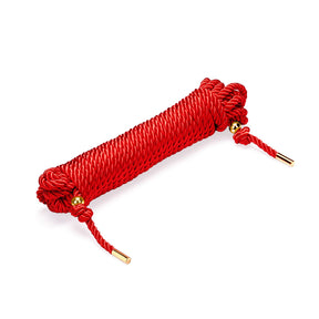 Shibari bondage rope in silky cotton, red and black